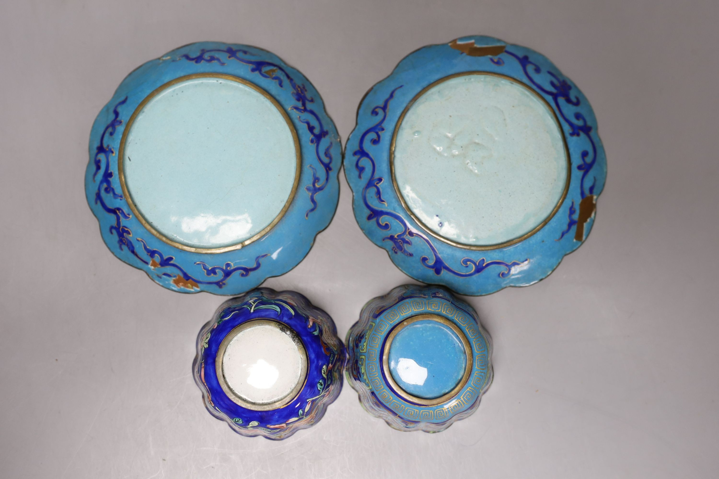 A group of 19th century Canton enamelled wares, including a vase and stand, two tea bowls and saucers and two dishes